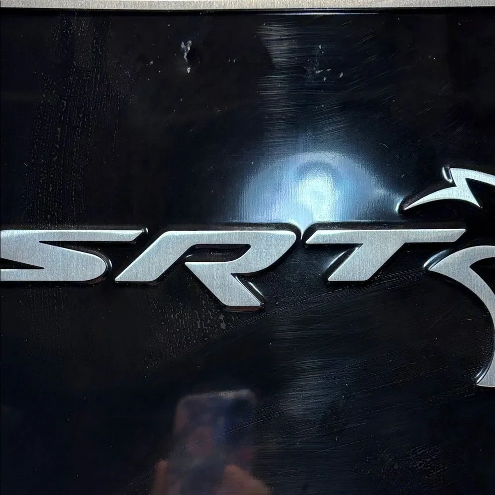 SRT Black and Silver Metal Sign